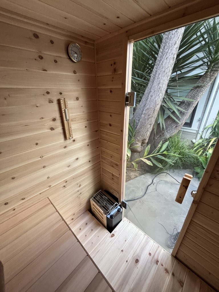 Anywhere Sauna interior with heater and open door view