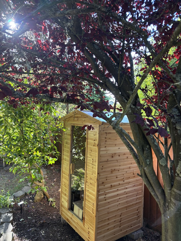 Anywhere Sauna in a backyard garden